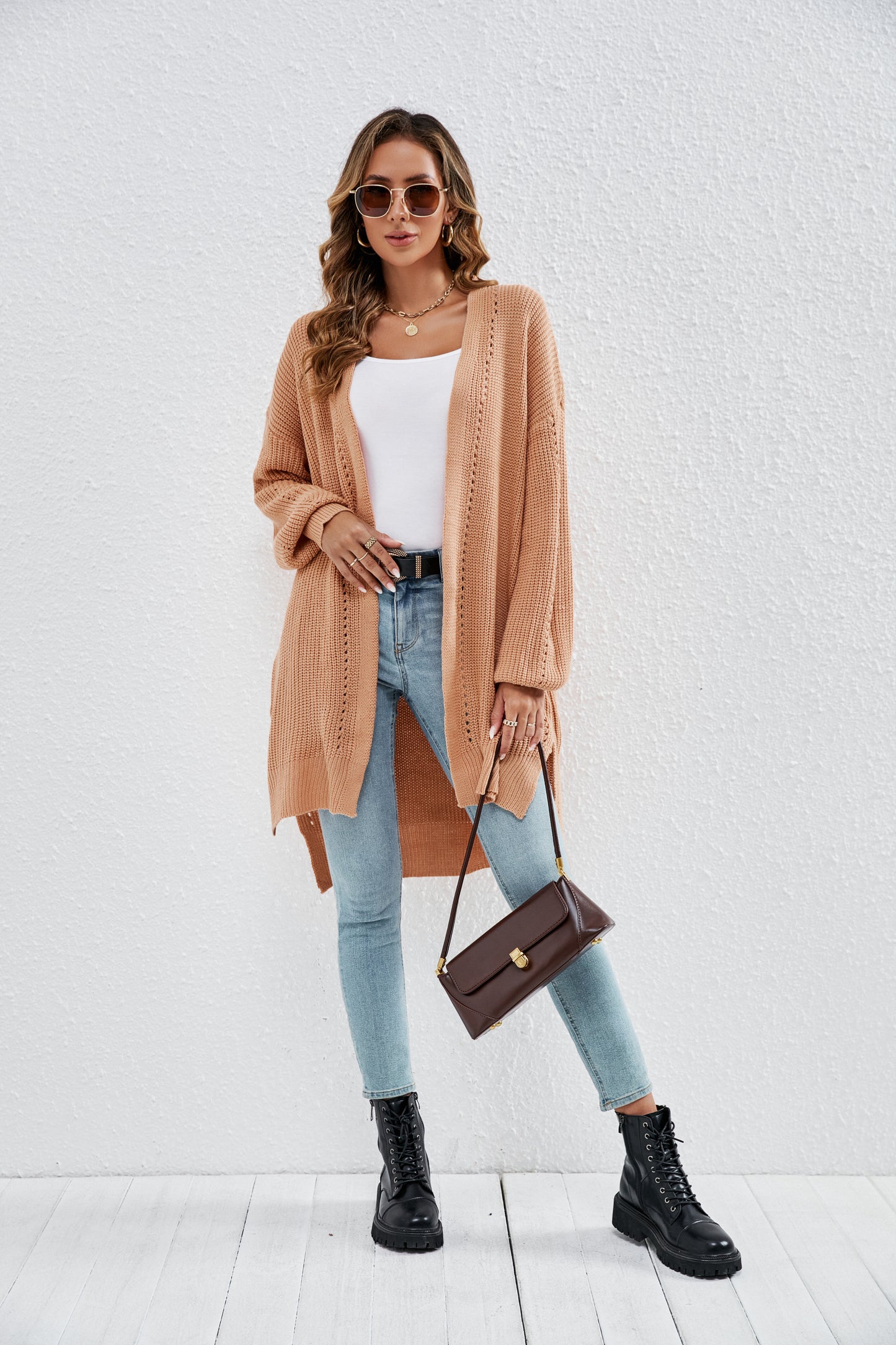 Vêtements pour femmes couleur unie pull ample manteau évider découpe extérieure assortie cardigan tricoté