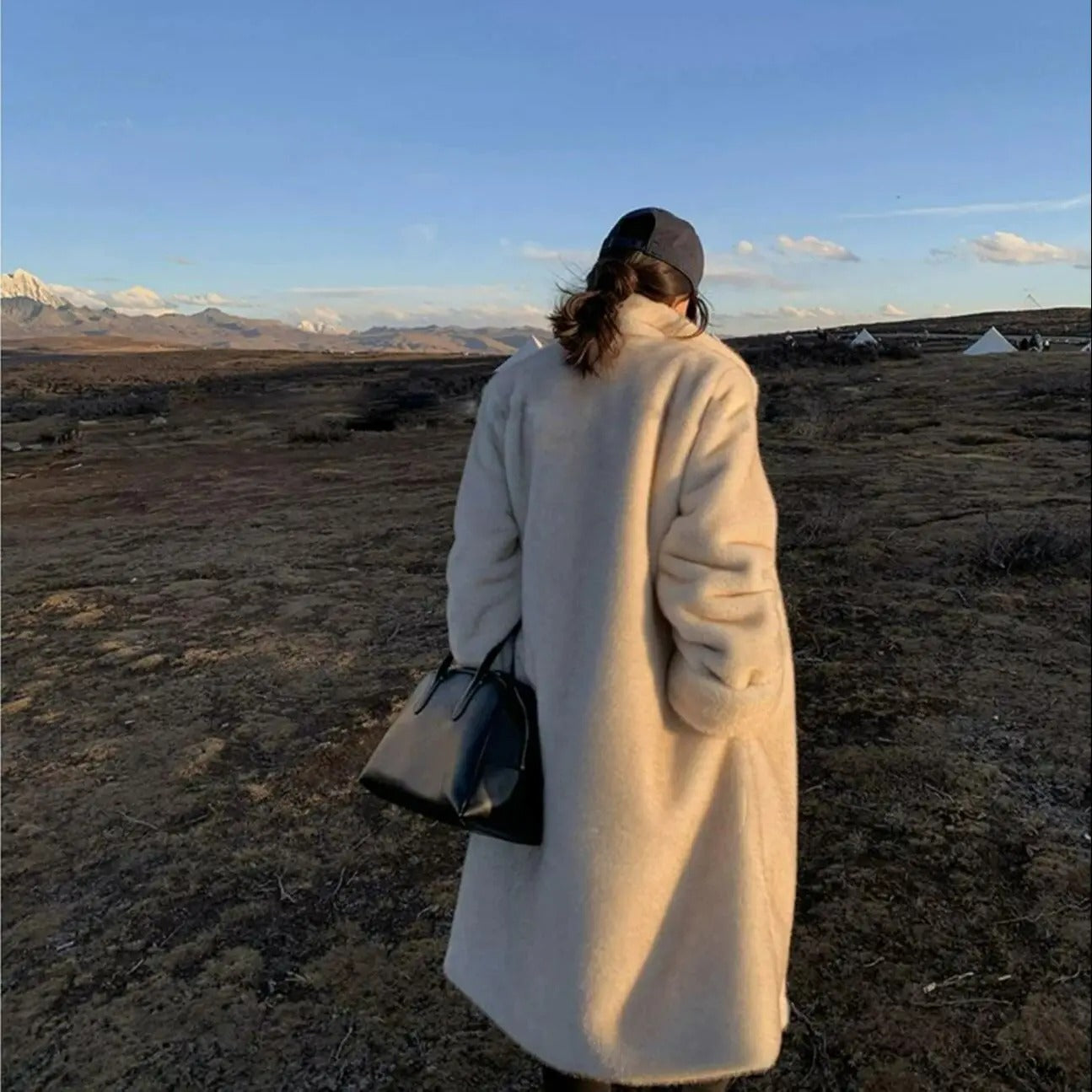 Abrigo de piel de cuero artificial de protección del medio ambiente de piel de visón femenino de invierno