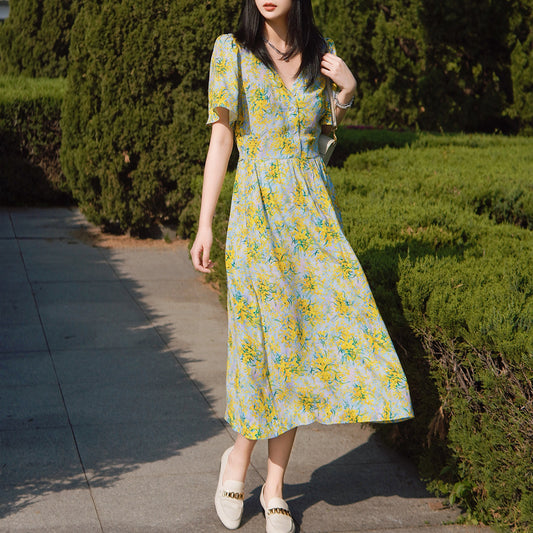 Primavera y verano Nuevo vestido largo con cuello en V y manga de hoja de loto Falda floral con cintura francesa