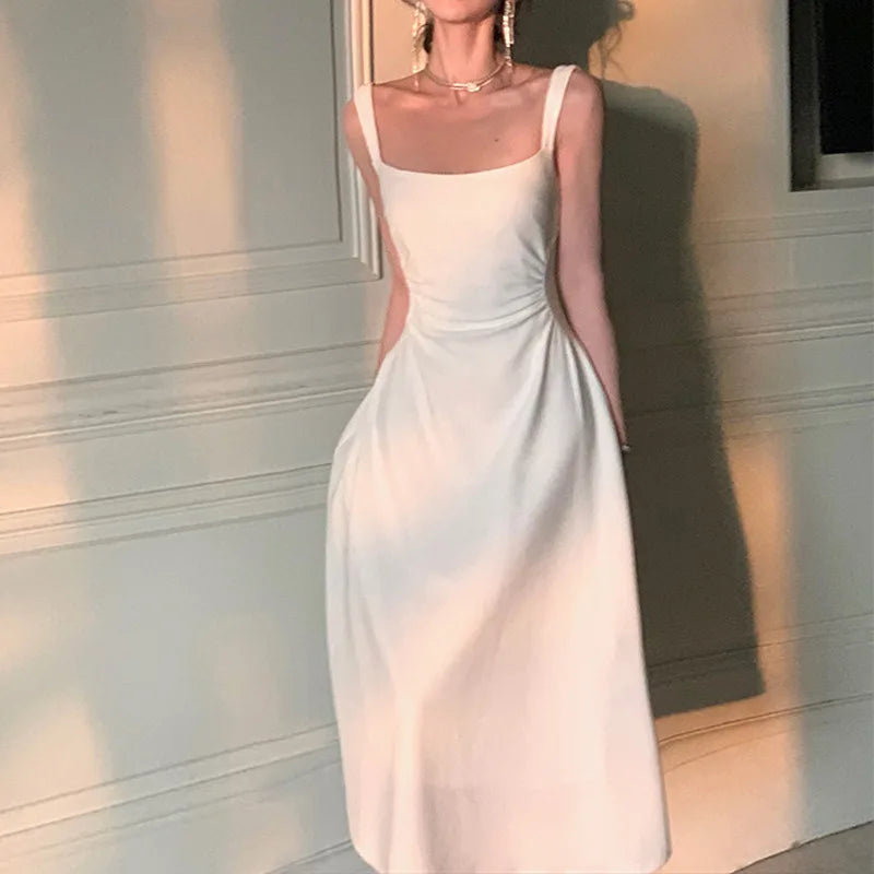 Vestido Midi blanco de fiesta nocturna para mujer, vestido de oficina ajustado Sexy sin mangas con tirantes, estilo playero, vestido coreano de una pieza para fiesta de noche 2023