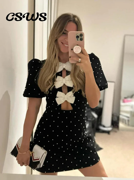 Vestido negro calado con lazo para mujer, minivestido Sexy de manga corta para fiesta, vestidos con cuello redondo, bata brillante elegante de primavera 2024