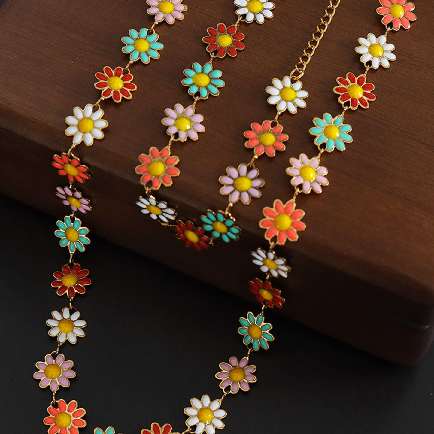 Collier de fleurs goutte à goutte d'huile en acier titane